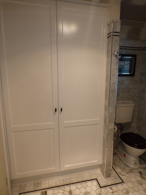 Photo of Thornton Italian styled bathroom with a linen cupboard