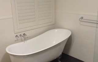 Bathroom renovation at lochinvar with a clawfoot freestanding bath